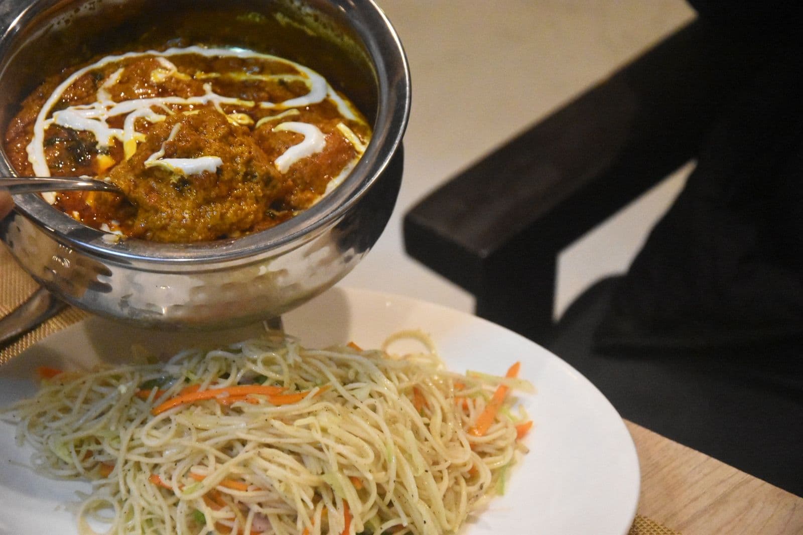 Vegetarian curry and noodles served at Shanti Regency